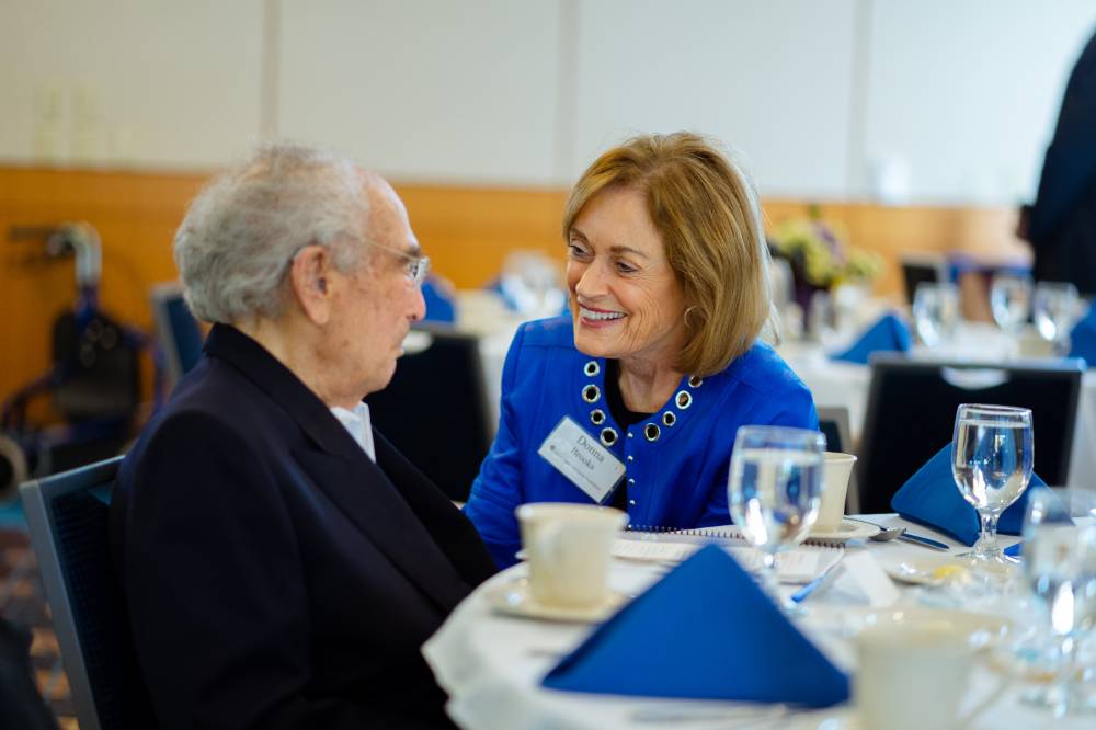 Seymour Padnos talking with Donna Brooks at the Foundation Annual Meeting